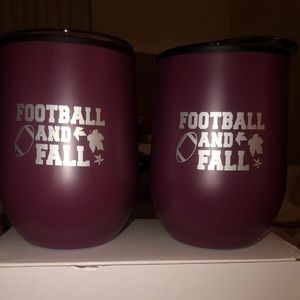 (2) burgundy cups with lids.